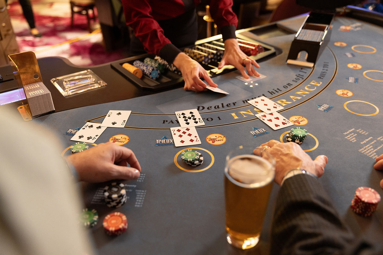 casino royale high roller black jack closeup drinks beer cards RCL WN