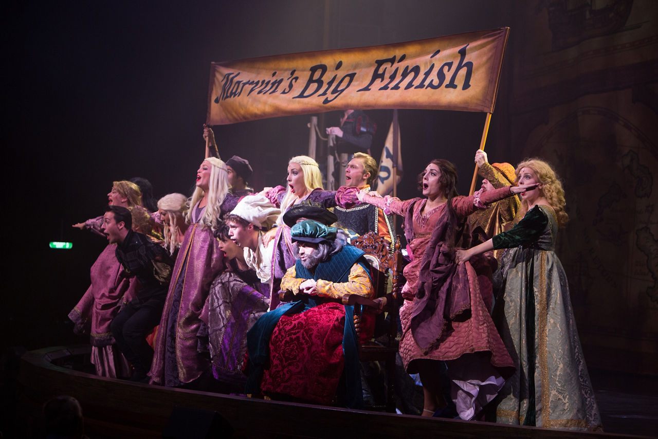 Columbus Musical Cruise Show Performers on stage singing Royal Caribbean