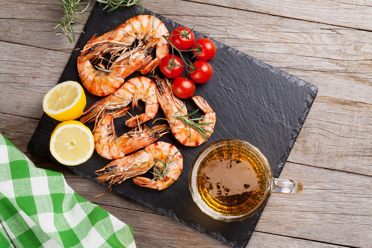 Grilled shrimp on a black board