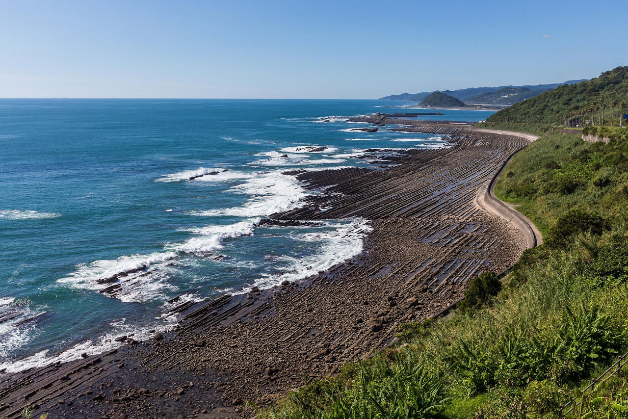 The Nichinan coastline viewpoint with dark volcanic sand in Miyazaki, Japan