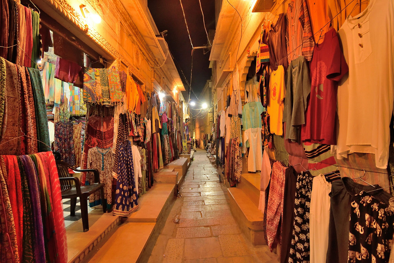 Colorful clothing for sale at street markets in India.