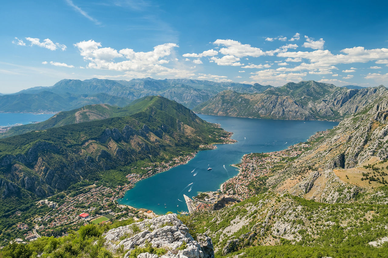 Summer view of the Bay of Kotor in Montenegro. Aerial view from Mount Lovcen Summer view of the Bay of Kotor in Montenegro. Aerial view from Mount Lovcen Summer view of the Bay of Kotor in Montenegro. Aerial view from Mount Lovcen 