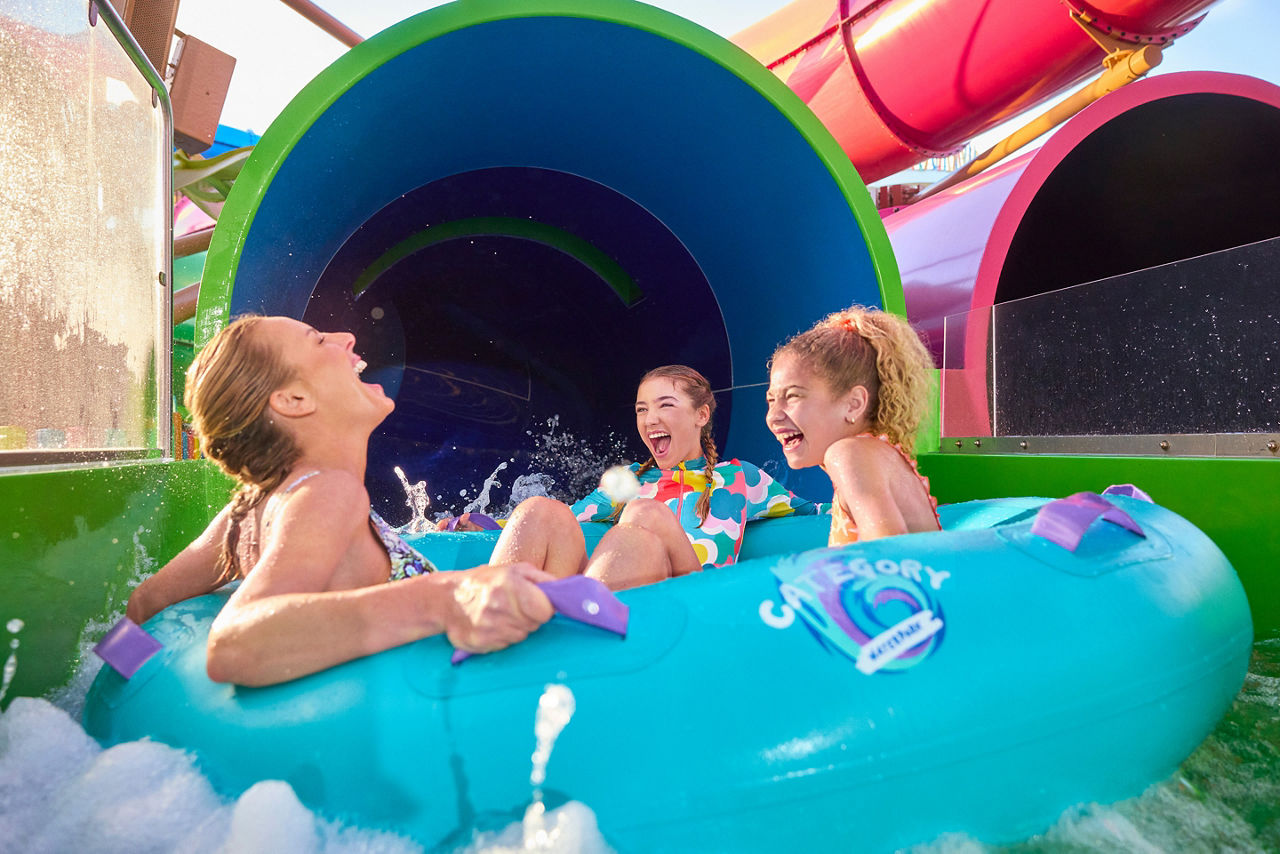 Mom and Daughters Enjoying Storm Surge at Cat6 Waterpark